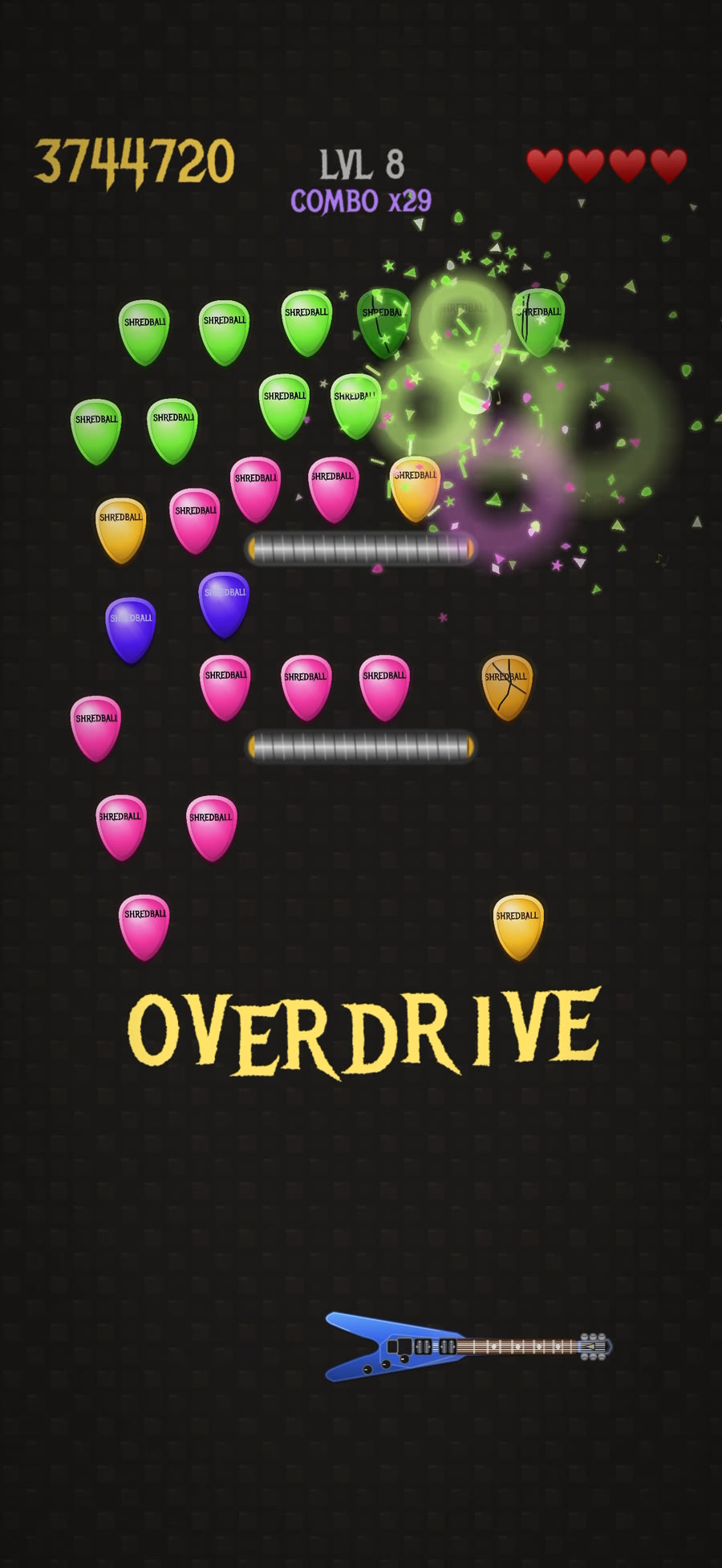 Guitar Breakout with colorful picks and overdrive energy